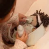 Baby doll in basket Evi GRS