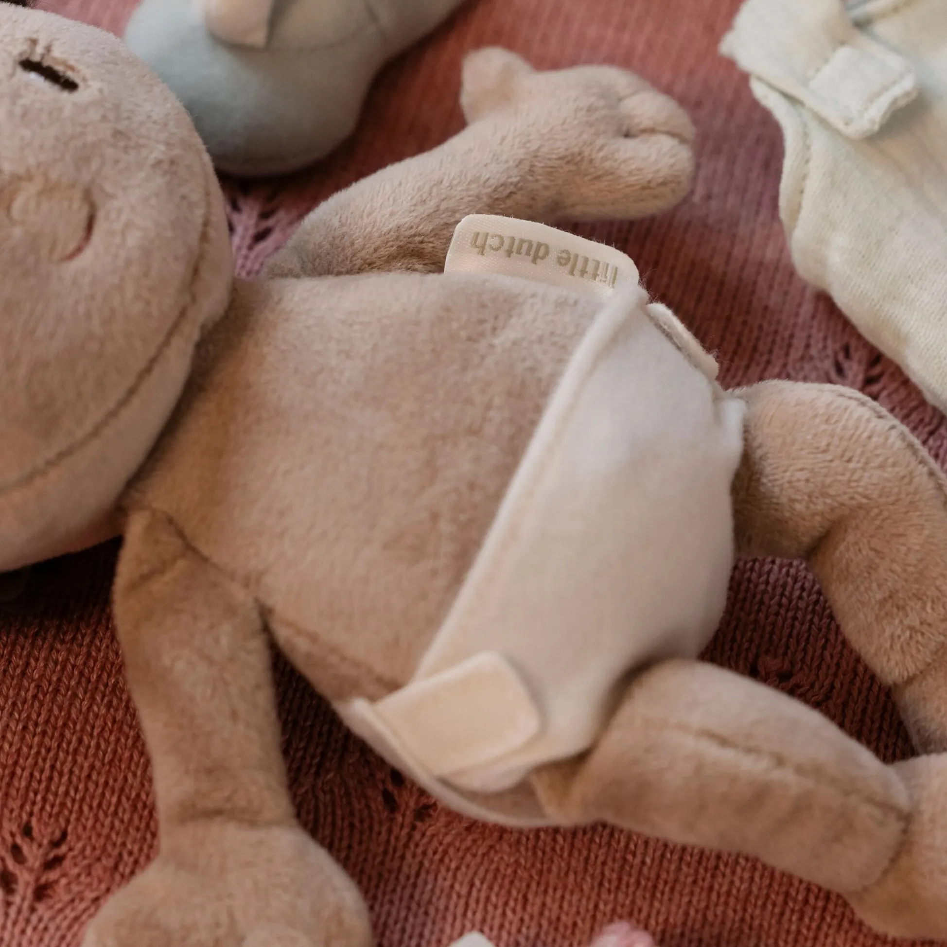 Baby doll in basket Evi GRS