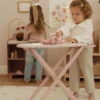Wooden ironing board with iron