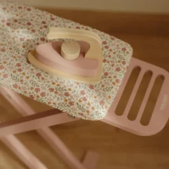 Wooden ironing board with iron
