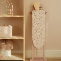 Wooden ironing board with iron